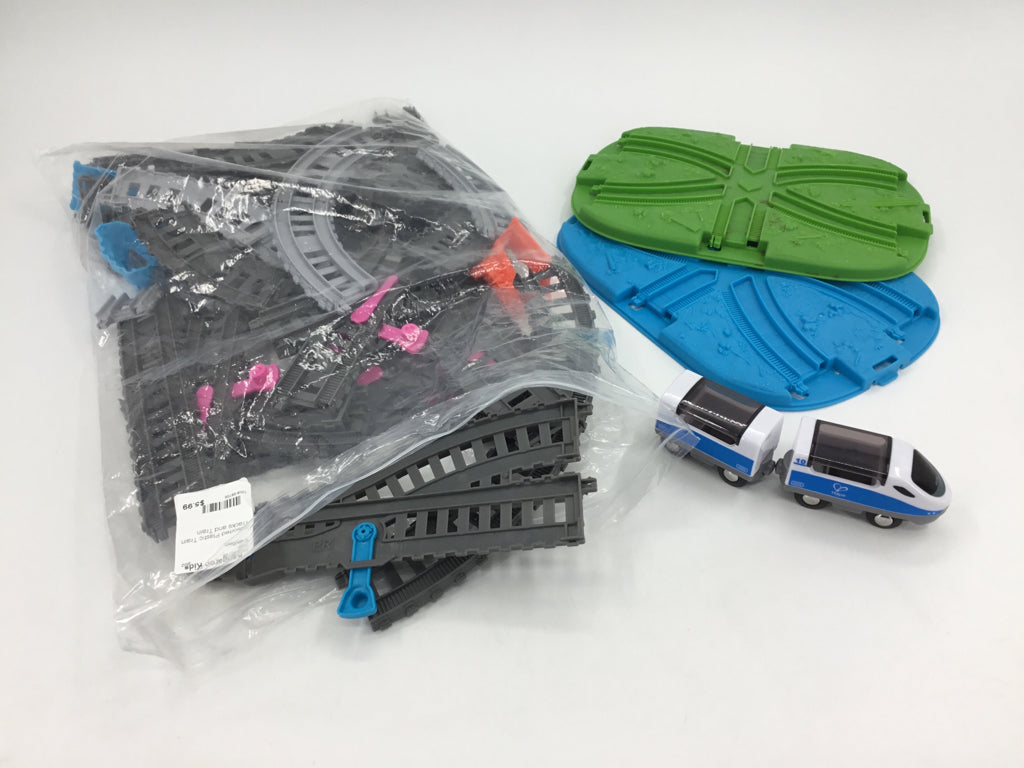 Assorted Plastic Train Tracks and Train