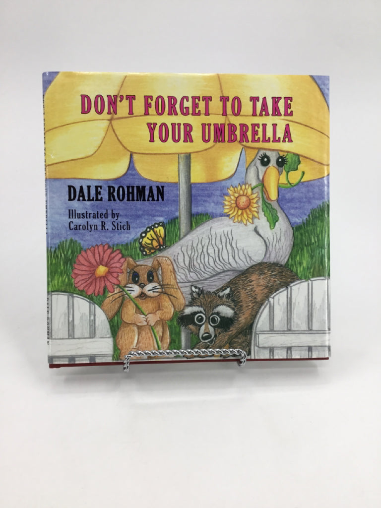 Don't Forget To Take Your Umbrella Hardback Book