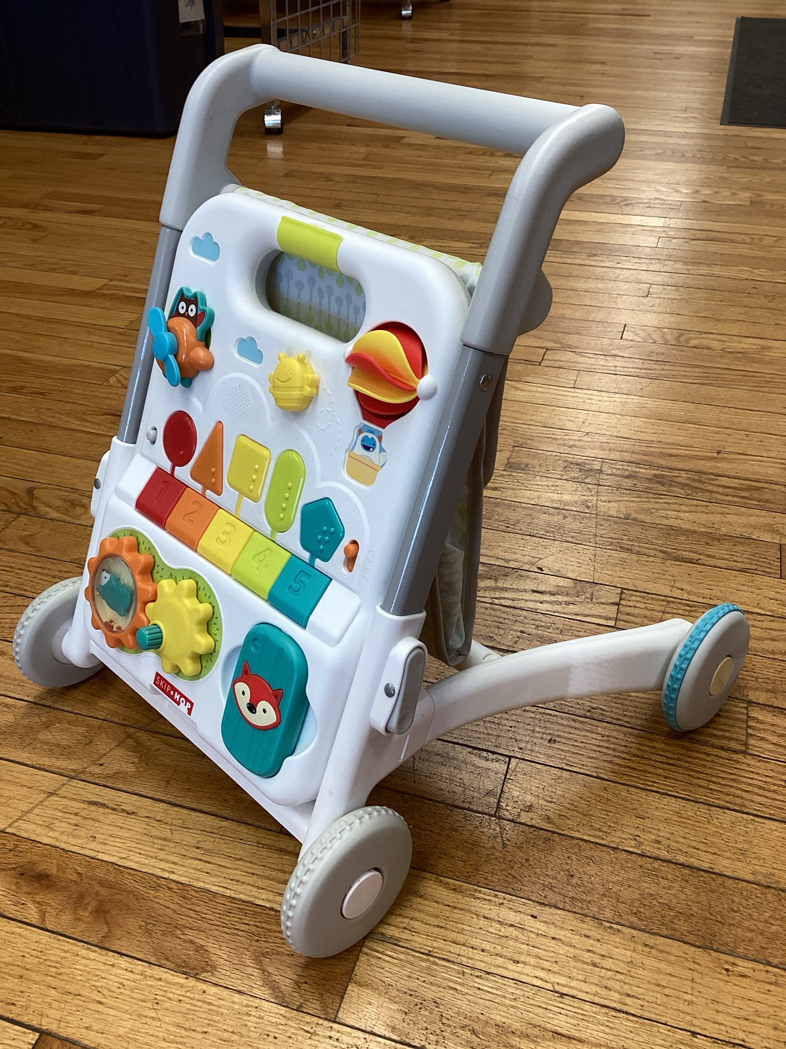 Skip Hop Baby Walker 4-in-1 Sit to Stand Convertible Light Up Walker