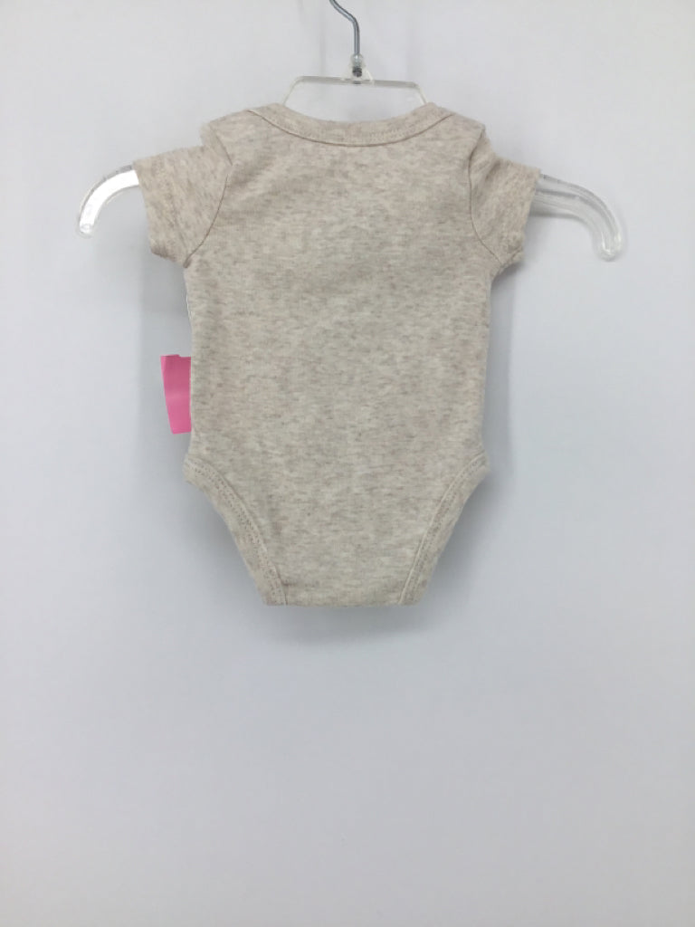 Nike Child Size Newborn Tan Onesie