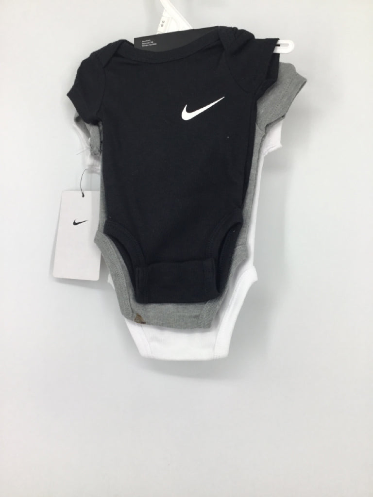 Nike Child Size Newborn White Onesie