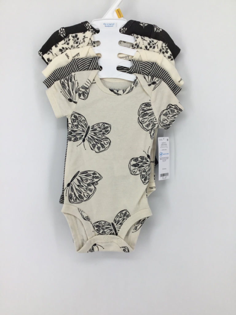 Carter's Child Size Newborn Cream Onesie