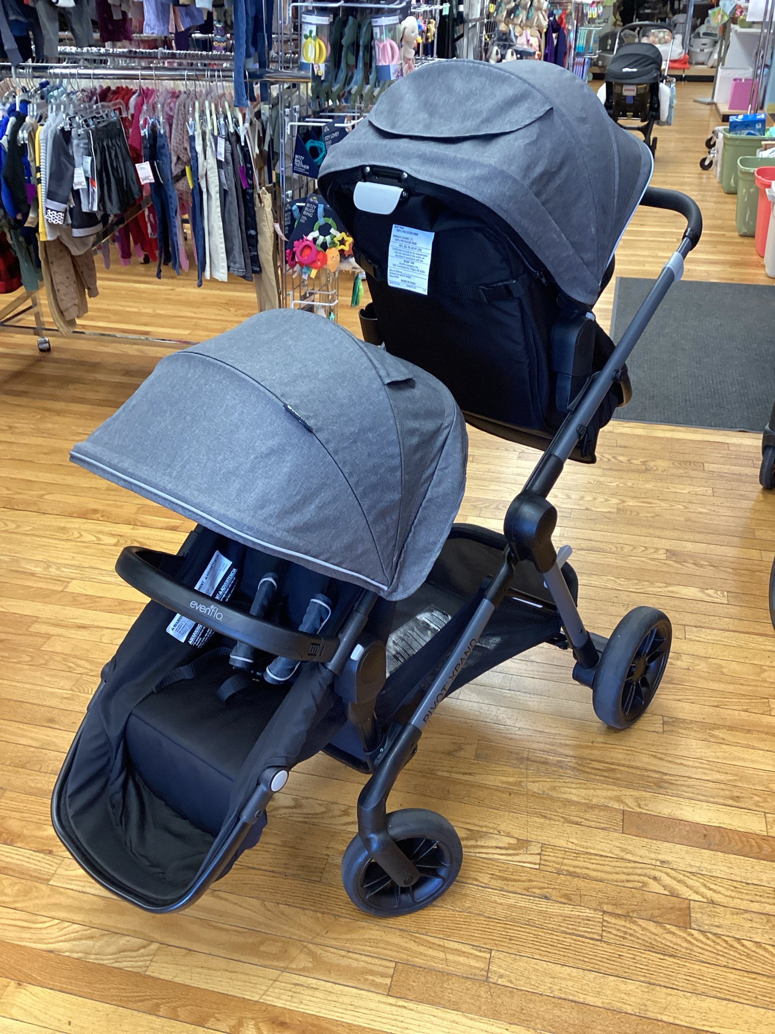 Evenflo Pivot Double Stroller with seat the converts to a bassinet