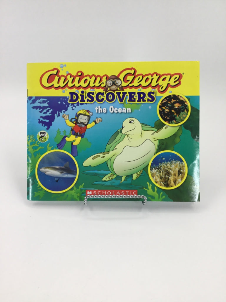 Scholastic Curious George Discovers the Ocean Paperback Book