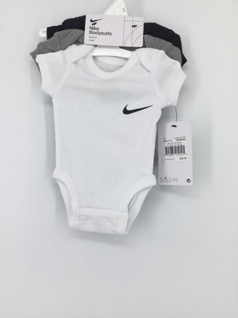 Nike Child Size Newborn White Onesie