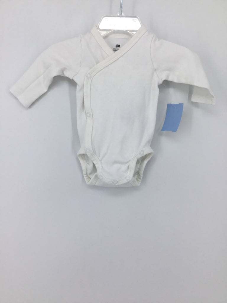 H & M Child Size Newborn White Onesie