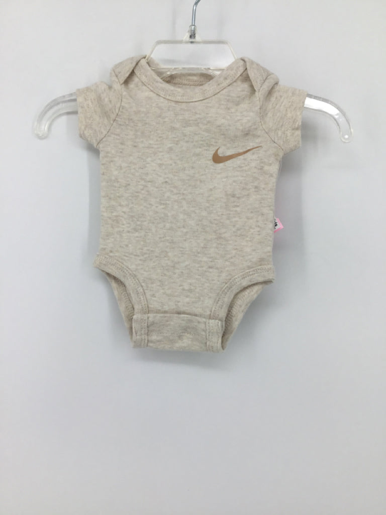 Nike Child Size Newborn Tan Onesie